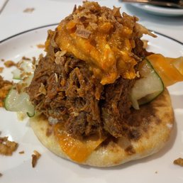 Katchapuri- pulled pork on a Gregorian cheese filled bread Katchapuri- pulled pork on a Gregorian cheese filled bread