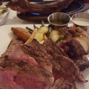 Coco Palm Restaurant - Nicely carved steak, mixed veggies, mashed potatoes and fried plantains! You can see the carved bone in the background - Cuban Near Me - Pomona, California Coco Palm Restaurant - Nicely carved steak, mixed veggies, mashed potatoes and fried plantains! You can see the carved bone in the background - Cuban Near Me - Pomona, California