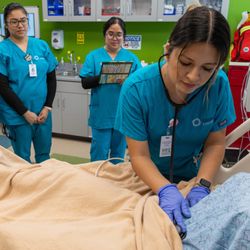 Unitek College - Fremont Campus - Unitek College Fremont: Bachelor of Science in Nursing students engaged in hands-on learning in the nursing skills lab.