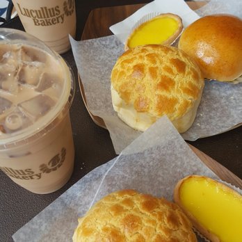 Lucullus Bakers & Roasters - Iced milk tea, pineapple bun, cha siu bun and omega 3 egg tart with cookie crust - Coffee Roasteries Near Me - Markham, Ontario