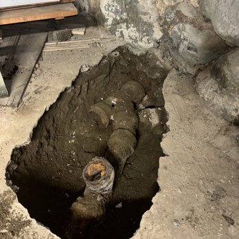 Bushi Plumbing and Heating - Exposed running trap, completely rusted - Plumbing Near Me - Revere, Massachusetts