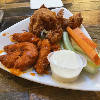 Oak Barrel Tavern - Half Buffalo and half stingy chicken tenders - Bars Near Me - Worcester, Massachusetts