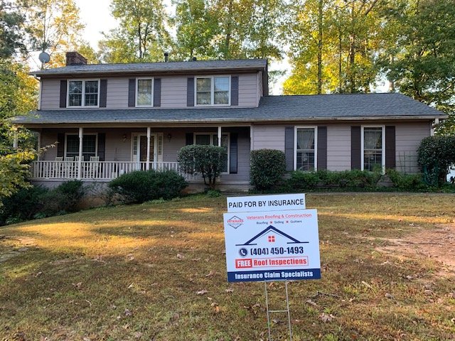 Slide of Veteran's Roofing Company