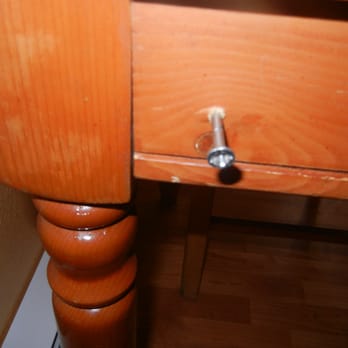 Elk Lake Resort - Cabin 17 - kitchen table legs loose and this screw caught my clothes and almost cut me - Resorts Near Me - Bend, Oregon