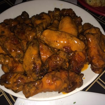 J Timothy's Taverne - This is what the bucket of wings looks like after it's dumped on to the plate from the bucket. (Buffalo, dirt style) - American Near Me - Plainville, Connecticut