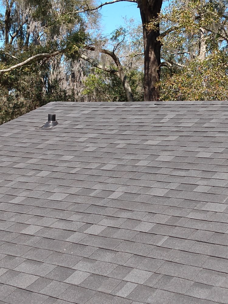 Slide of UnZucky Roofing