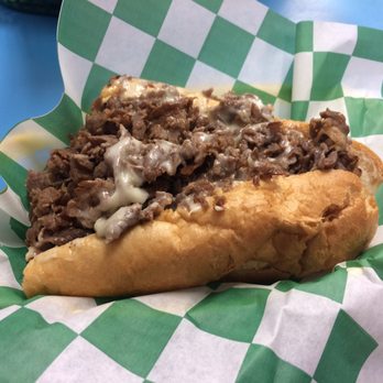 Rick's Cheesesteak Shop - Large Cheesesteak (Only 1/2 pictured)... $9.95 pre tax - Cheesesteaks Near Me - Williamsburg, Virginia Rick's Cheesesteak Shop - Large Cheesesteak (Only 1/2 pictured)... $9.95 pre tax - Cheesesteaks Near Me - Williamsburg, Virginia