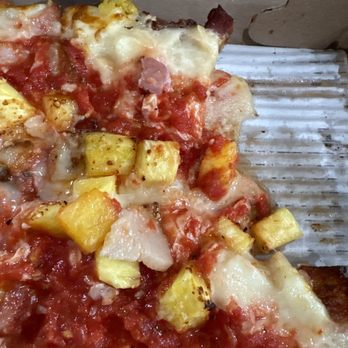 Emmy Squared Pizza - Uncooked bacon yummmm!  Had to dissect the pie and cook the bacon again before eating... terrible skills in preparing a pizza... - Pizza Near Me - Miami, Florida
