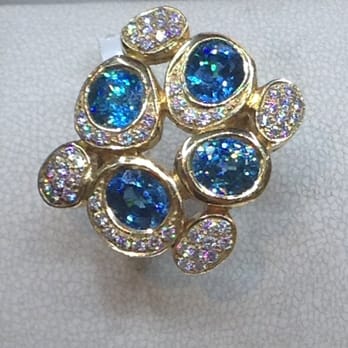 Lambros Goldsmith - Blue zircon diamond ring - Watches Near Me - Skagway, Alaska Lambros Goldsmith - Blue zircon diamond ring - Watches Near Me - Skagway, Alaska