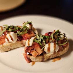 Cork & Bull Chophouse - Crostini with strawberries and mozzarella pearls