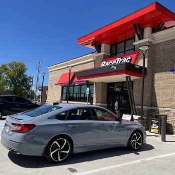 RaceTrac - a car parked in front of a fast food restaurant - Gas Stations Near Me - Smyrna, Tennessee