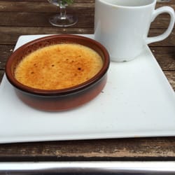 Brännö Värdshus AB - Creme brûlée and coffee. You can also see part of my wife's dark chocolate cake with raspberry compote. So good!