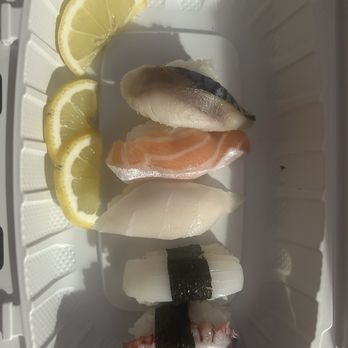 Hello Sushi - Sushi plater that is suppose to come with 6 pieces but only has 5???? Who serves sushi with lemon????? Where's my wasabi & ginger ! - Sushi Bars Near Me - Fullerton, California