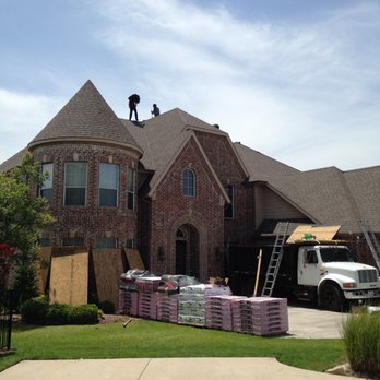 Hart Construction - a man on the roof of a house - General Contractors Near Me - Southlake, Texas Hart Construction - a man on the roof of a house - General Contractors Near Me - Southlake, Texas