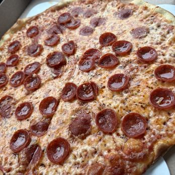 St. Francis Apizza - Tavern style on Monday pie cut, usually it's cut into squares Chicago style thin crust. - Pizza Near Me - Cincinnati, Ohio