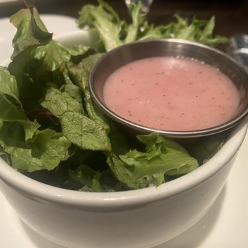 M's Pub - Mixed green salad with a poppy seed dressing - New American Near Me - Omaha, Nebraska M's Pub - Mixed green salad with a poppy seed dressing - New American Near Me - Omaha, Nebraska