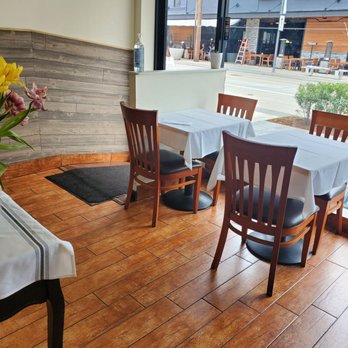 EVOO & Lemon - a table and chairs in a restaurant - Mediterranean Near Me - Millburn, New Jersey
