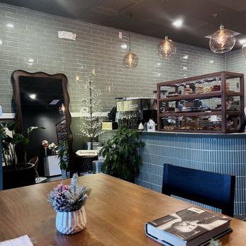 Rommy - Large table near front counter area - Coffee & Tea Near Me - Rochester Hills, Michigan