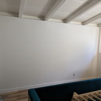 Ukrainian Handyman Service - We are adding panels to the wall afterwards, and so only requested a basic drywall finish. - Handyman Near Me