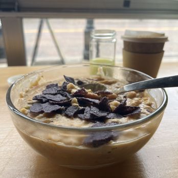 Juice Pharm - a bowl of oatmeal and a cup of coffee - Juice Bars & Smoothies Near Me - Duluth, Minnesota