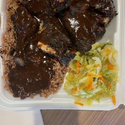 Jerk chicken with Cabbage and rice and peas Jerk chicken with Cabbage and rice and peas