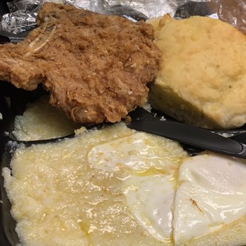 Sharon's Kitchen - Fried Pork Chop Grits Biscuit and Over medium eggs - New American Near Me - Baton Rouge, Louisiana Sharon's Kitchen - Fried Pork Chop Grits Biscuit and Over medium eggs - New American Near Me - Baton Rouge, Louisiana