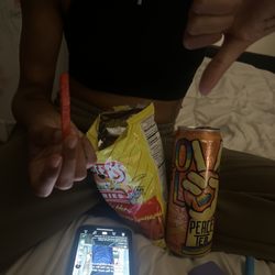 Stale chip next to chip bag with thumbs down cuz the chips are stale and nasty.