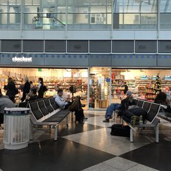 Checkout - Munich, Germany - Chocolates, reading glasses, recharging devices, small selection of gifts.