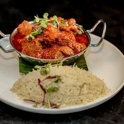 The Continent DC - Just a simple Beef tomato stew and white rice.