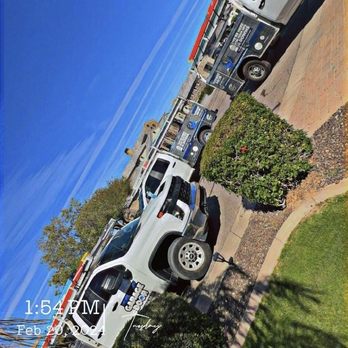 Grease Monkey Garage Doors - Service trucks working one of our customers shop doors - Garage Door Services Near Me - Gilbert, Arizona Grease Monkey Garage Doors - Service trucks working one of our customers shop doors - Garage Door Services Near Me - Gilbert, Arizona