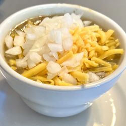 Sherrie's Place - Award winning cup of Green chili with diced onions & shredded cheddar cheese.  Delicious!!!!