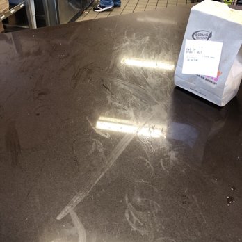 Dunkin' -  a man standing in a commercial kitchen - Donuts Near Me - South Burlington, Vermont