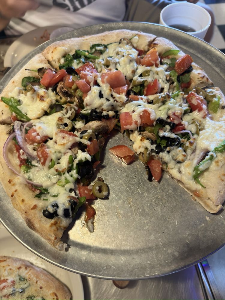 Roman Oven Pizzeria Logo