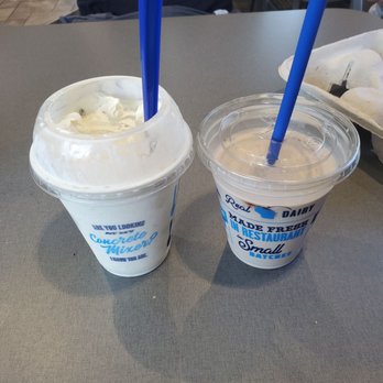 Culver's - A concrete mixer vanilla with cookie extra cookie dough and a chocolate shake. - Burgers Near Me - Margate, Florida