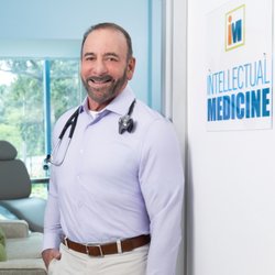 Intellectual Medicine - Dr. Stephen Petteruti welcoming a patient to his practice.
