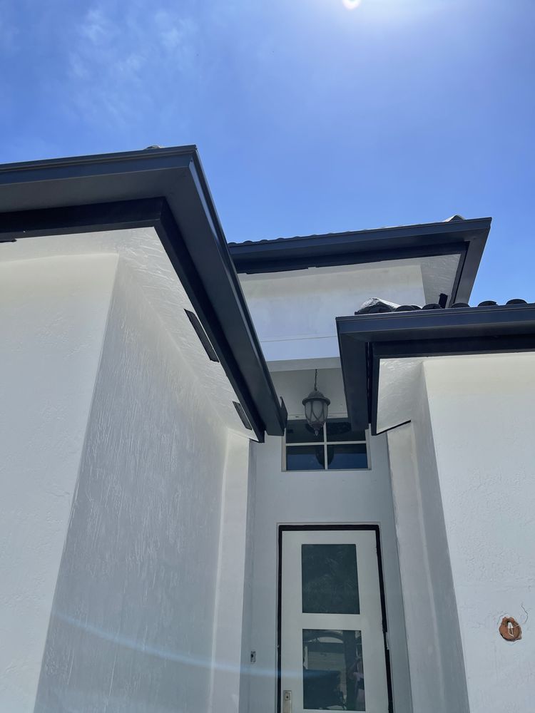 Slide of Jad Rain Gutters