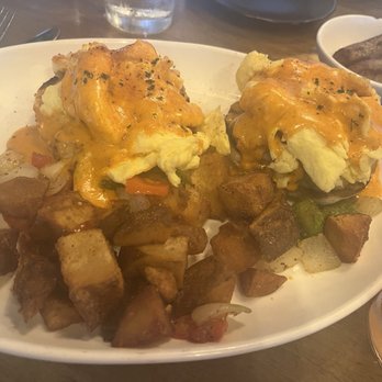 Michael's Cafe White Marsh - Crab cake Benedict (egg scrambled, not poached) - Bars Near Me - Middle River, Maryland Michael's Cafe White Marsh - Crab cake Benedict (egg scrambled, not poached) - Bars Near Me - Middle River, Maryland