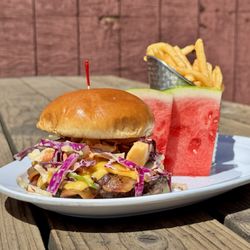 The Roost - Mango bacon burger special with fresh watermelon and fries