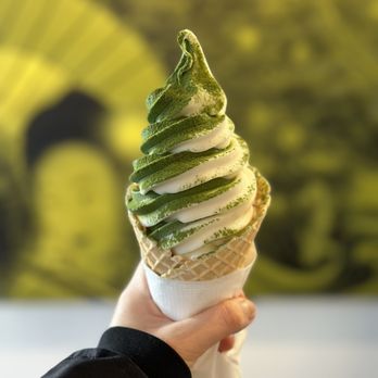 Matcha Cafe Maiko - a hand holding a green matcha ice cream cone - Coffee & Tea Near Me - Richmond, British Columbia
