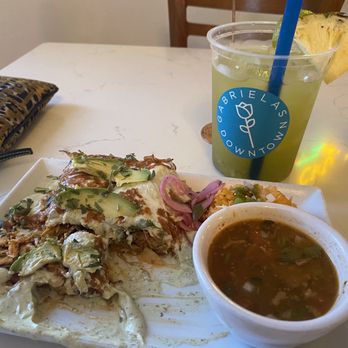 Gabriela's Downtown - Cucumber and pineapple Fresca mixed and Avocado chicken enchiladas...I think - Mexican Near Me - Austin, Texas