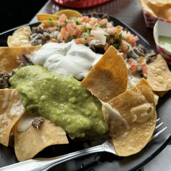 Taqueria La Mordida - Carne Asada Super Nachos - Mexican Near Me - Half Moon Bay, California Taqueria La Mordida - Carne Asada Super Nachos - Mexican Near Me - Half Moon Bay, California