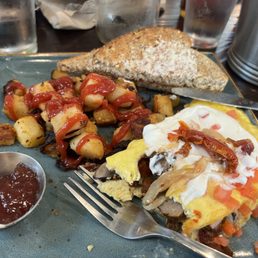 That's the works omelette from the one on Archer road it was awesome. 10 to the cooks over there.