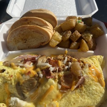 Sambito Cuisine - an omelet and potatoes - Food Trucks Near Me Sambito Cuisine - an omelet and potatoes - Food Trucks Near Me