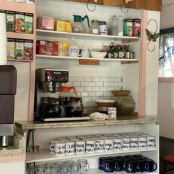 Village Coffee Shoppe - Coffee bar with their plethora of coffee mugs for their regulars