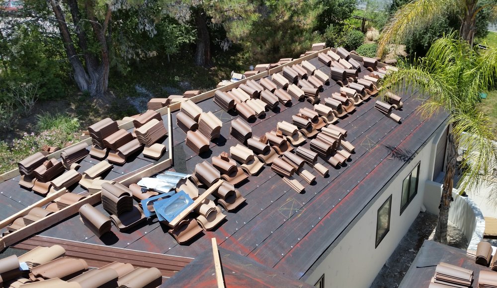 Slide of Woolbrights Roofing and Construction