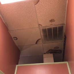 Ceiling in bathroom hallway.