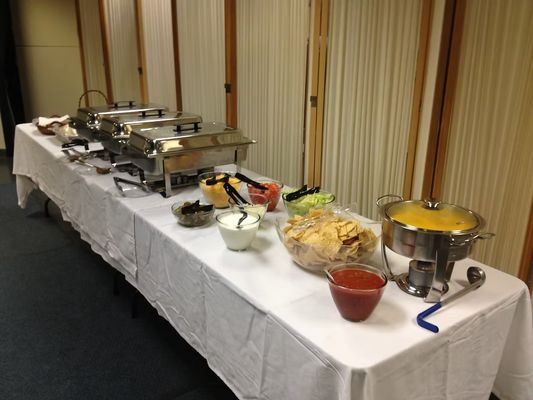 Food Station Catering Services - $1000 Minimum for Catering & Personal Chef Services. 2 Chefs Catering has been owned & operated by Ryan & Tricia Peterson since 2009. Both attended Le Cordon Bleu in Scottsdale, AZ, where they earned associate degrees in culinary arts. Originally from Hoyt & Mayetta, KS, Ryan & Tricia understand what local clients expect from a quality catering experience & consistently strive to exceed those expectations. They cater events of all sizes & pride themselves on a personalized approach, ensuring each event is special & tailored to the client’s needs. 2 Chefs Catering serves Topeka & the surrounding areas. Head Chef Ryan graduated from culinary school in 2009. His experience includes working at several restaurants in Topeka, KS, & Phoenix, AZ, such as serving as kitchen manager at Blind Tiger Brewery & Top of the Tower, & spending over five years with Aboud’s Catering. In Arizona, Ryan worked at Michael’s Catering & Olives & Ivy. He is passionate about cooking for both friends & clients. Tricia, who also attended culinary school, specializes in baking. She enjoys creating specialty desserts—including crème brûlée, scones, & other confections—for the Millennium Cafe. In addition to her role as baker & front-of-house manager, she manages the website, social media accounts, & administrative tasks for both the Cafe & the catering business. Tricia holds a degree from Washburn University & enjoys writing, reading, & blogging in her free time. Food Station Catering Services - $1000 Minimum for Catering & Personal Chef Services. 2 Chefs Catering has been owned & operated by Ryan & Tricia Peterson since 2009. Both attended Le Cordon Bleu in Scottsdale, AZ, where they earned associate degrees in culinary arts. Originally from Hoyt & Mayetta, KS, Ryan & Tricia understand what local clients expect from a quality catering experience & consistently strive to exceed those expectations. They cater events of all sizes & pride themselves on a personalized approach, ensuring each event is special & tailored to the client’s needs. 2 Chefs Catering serves Topeka & the surrounding areas. Head Chef Ryan graduated from culinary school in 2009. His experience includes working at several restaurants in Topeka, KS, & Phoenix, AZ, such as serving as kitchen manager at Blind Tiger Brewery & Top of the Tower, & spending over five years with Aboud’s Catering. In Arizona, Ryan worked at Michael’s Catering & Olives & Ivy. He is passionate about cooking for both friends & clients. Tricia, who also attended culinary school, specializes in baking. She enjoys creating specialty desserts—including crème brûlée, scones, & other confections—for the Millennium Cafe. In addition to her role as baker & front-of-house manager, she manages the website, social media accounts, & administrative tasks for both the Cafe & the catering business. Tricia holds a degree from Washburn University & enjoys writing, reading, & blogging in her free time.