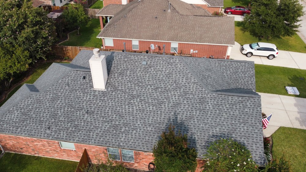 Slide of Xacte Roofing & Restoration