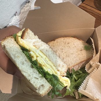 Farm Cafe - Scrambled Eggs w/ Swiss Cheese & Argula on Sourdough Bread - Breakfast & Brunch Near Me - Valhalla, New York