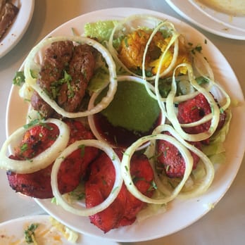 Saffron Grill - Tandoori Deluxe I think? The fish was too salty, the lamb too dry. Checked and beef amazing! - Indian Near Me - Seattle, Washington